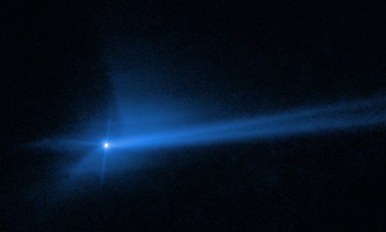 Hubble captures movie of DART asteroid impact debris